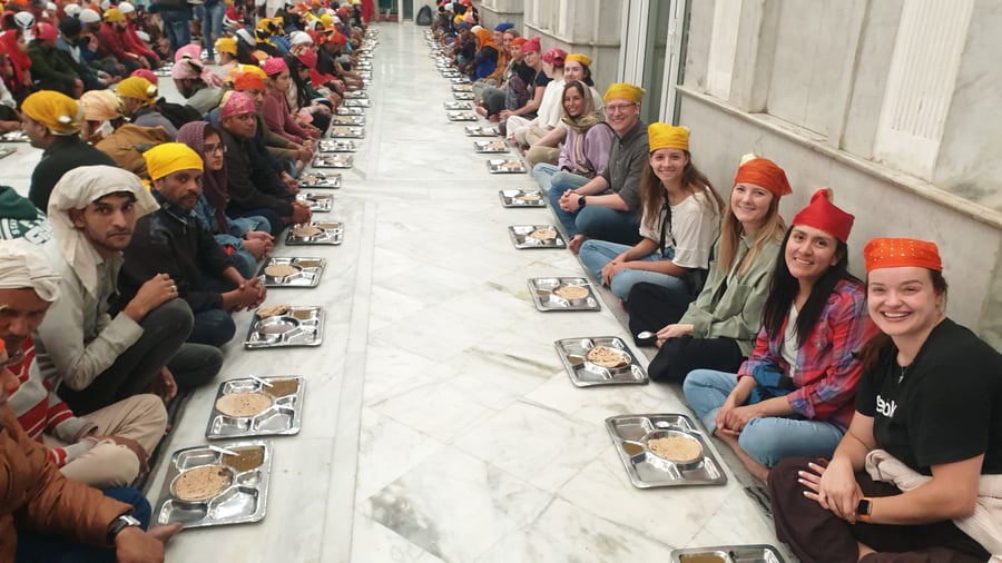 Community dinner on a group trip in India