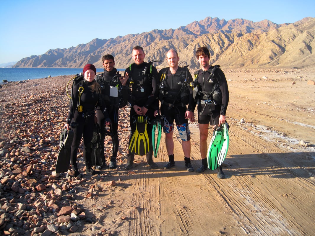 A group in their diving gear in Egypt