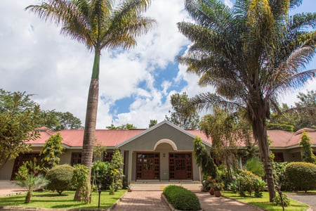 Indgangen til Arusha Planet Lodge