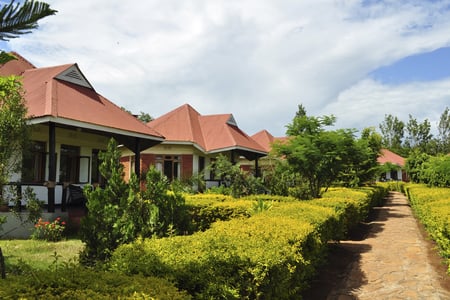 De små cottages på Bougainvillea Safari Lodge