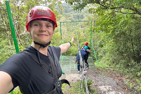 Try ziplining through the lush rainforest. 