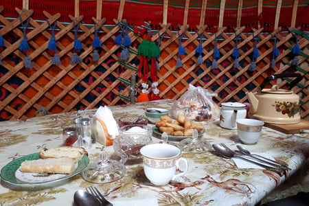 Snacks and tea in the yurt 