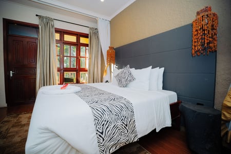 Rummeligt værelse på Arusha Planet Lodge