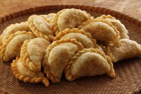 Smaka empanadas med olika fyllningar