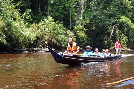 A group of people on a boat tour in Malaysia
