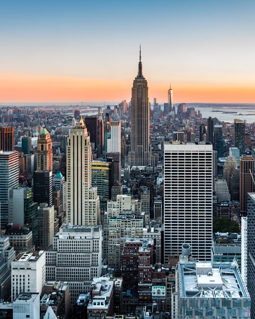 New Yorks skyline i solnedgang