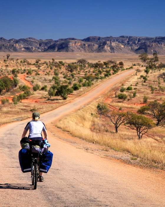 Traveller on a bike in Madagascar