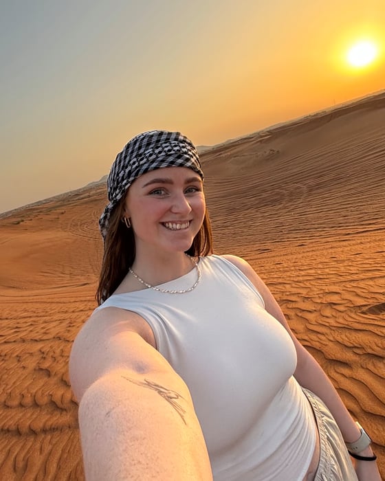 Woman in a sunset desert