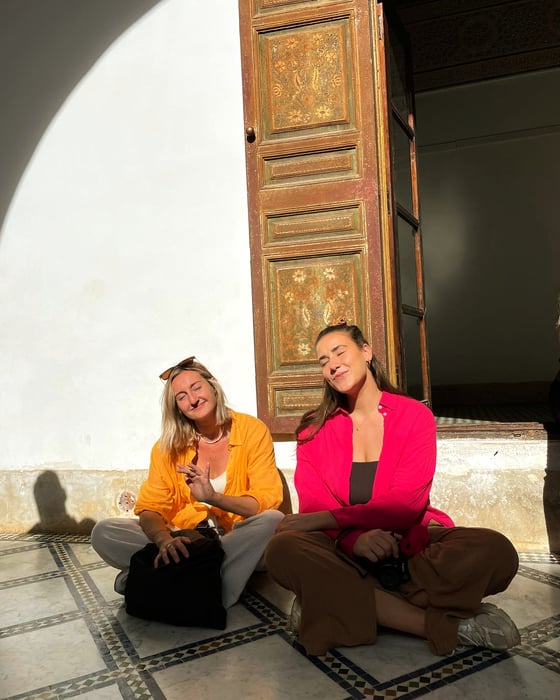 Travellers in historic building in Marrakesh