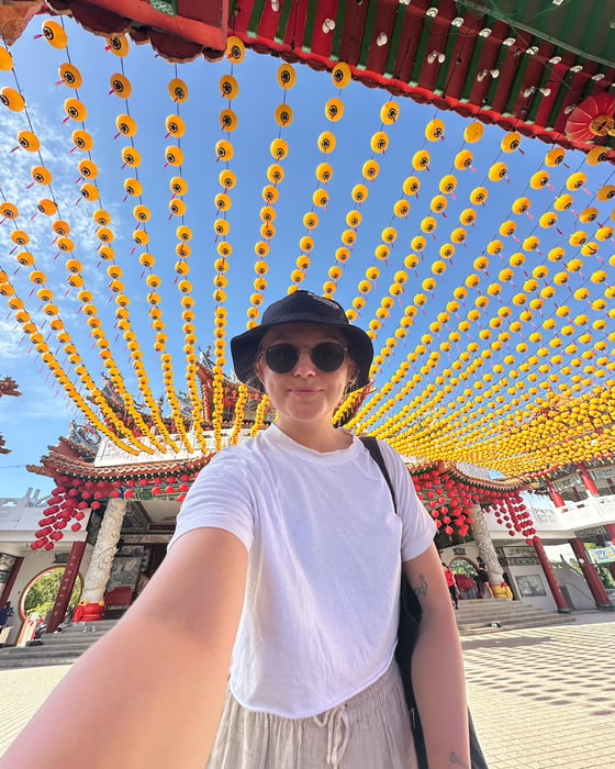 Traveller under yellow lanterns