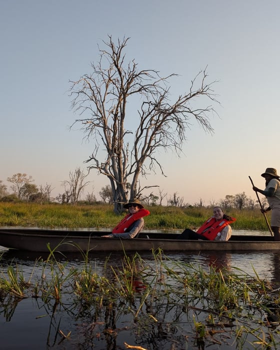 Travellers in a mokoro in Botswana