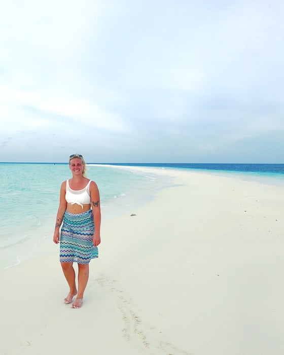 A girl at the beach in the Maldives