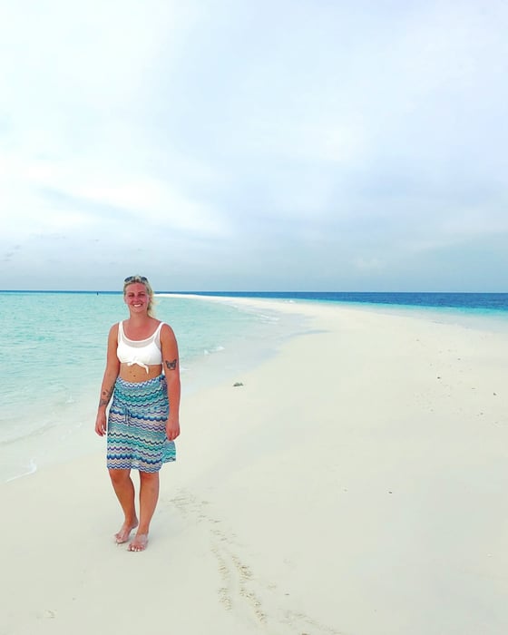 A girl at the beach in the Maldives