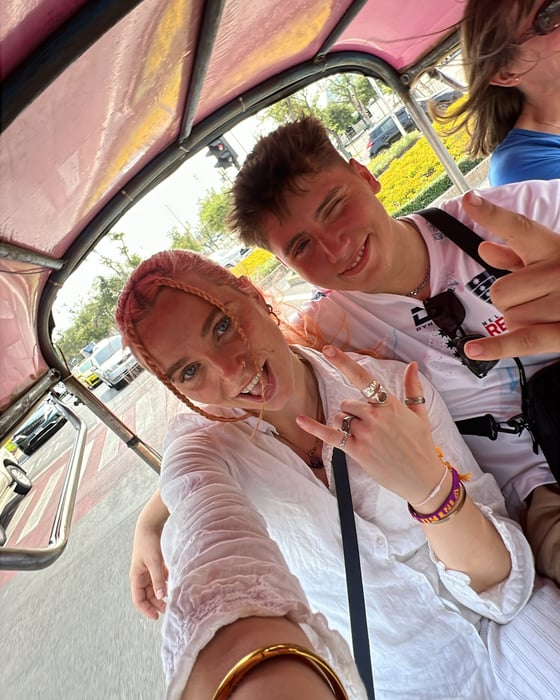 Young people in a TukTuk