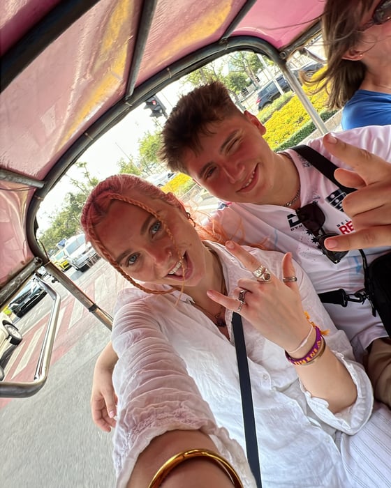 Young people in a TukTuk