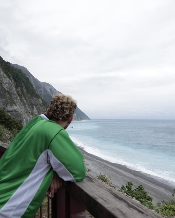 Traveller looking out over the ocean in Taiwan