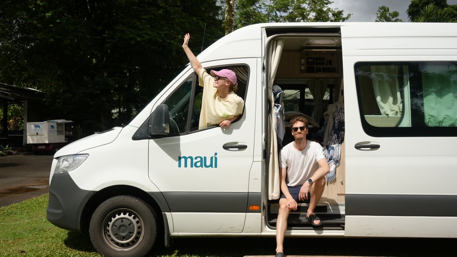 Travellers and their campervan in Australia