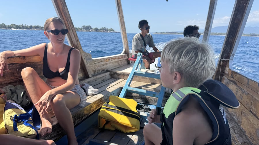 A group exploring around Gili T on a boat