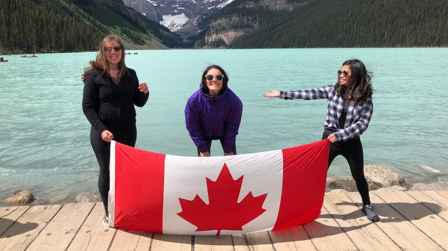 Friends enjoying stunning views at Lake Louise