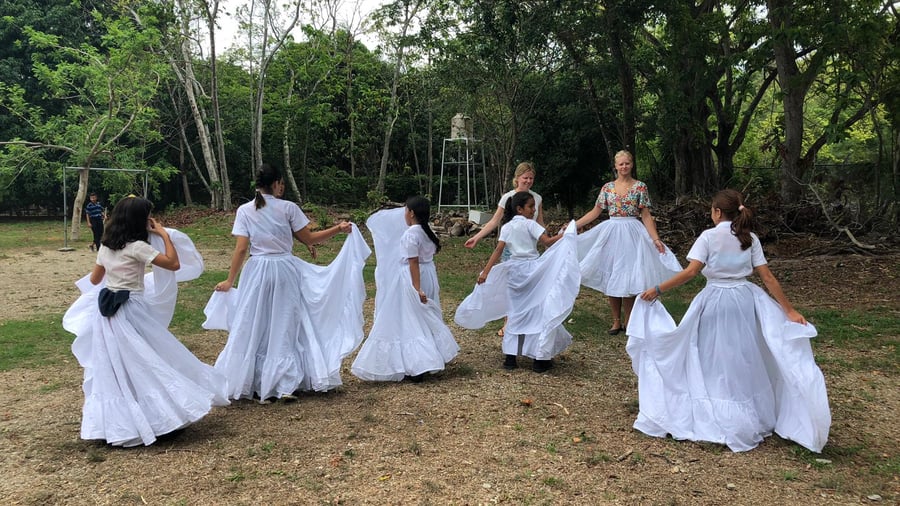 Locals giving a dance lesson