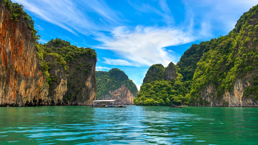 Limestone cliffs and blue waters in Phuket