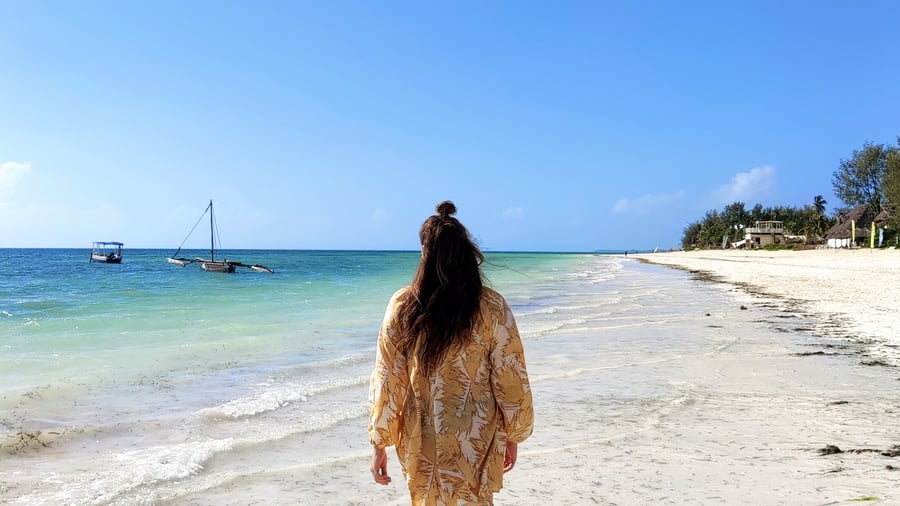 Woman on beach in Zanzibar