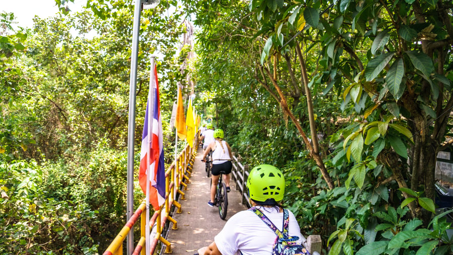 Group of people exploring Thailand by Bike