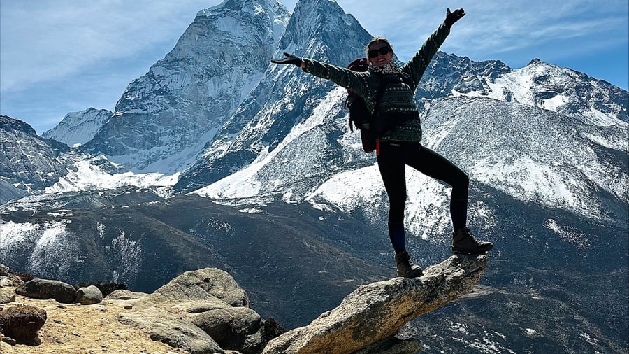 Traveller posing with stunning landscapes in Nepal