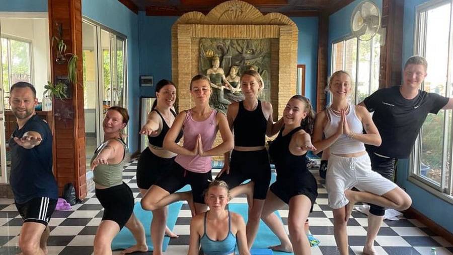 Join a yoga class in Thailand