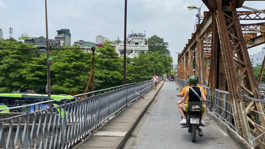 Traveller on a motorbike in Hanoi