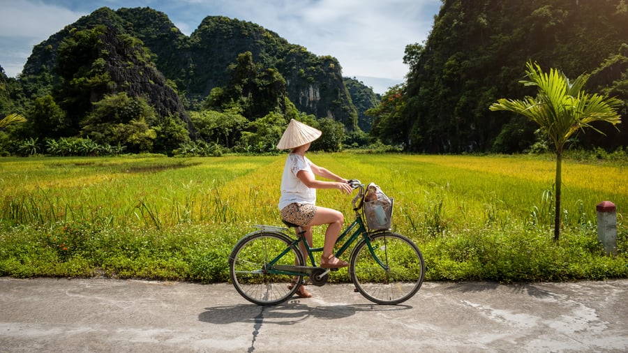 Traveller on a bike in Ninh Binh