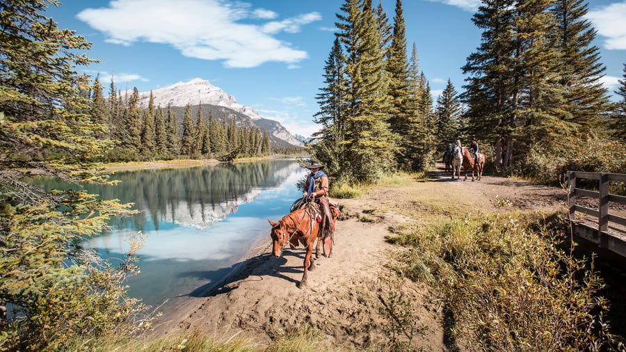 Someone horseback riding in Banff