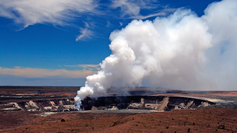 Majestic volcanic landscape with billowing steam