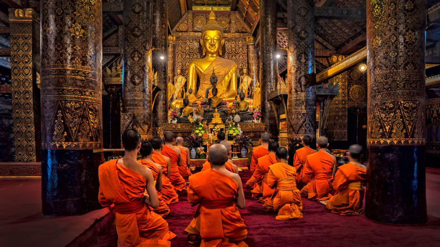 Buddhistiske munke i Wat Xieng Thong-templet
