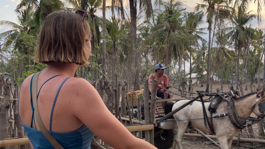 Girl riding a bike on Gili T