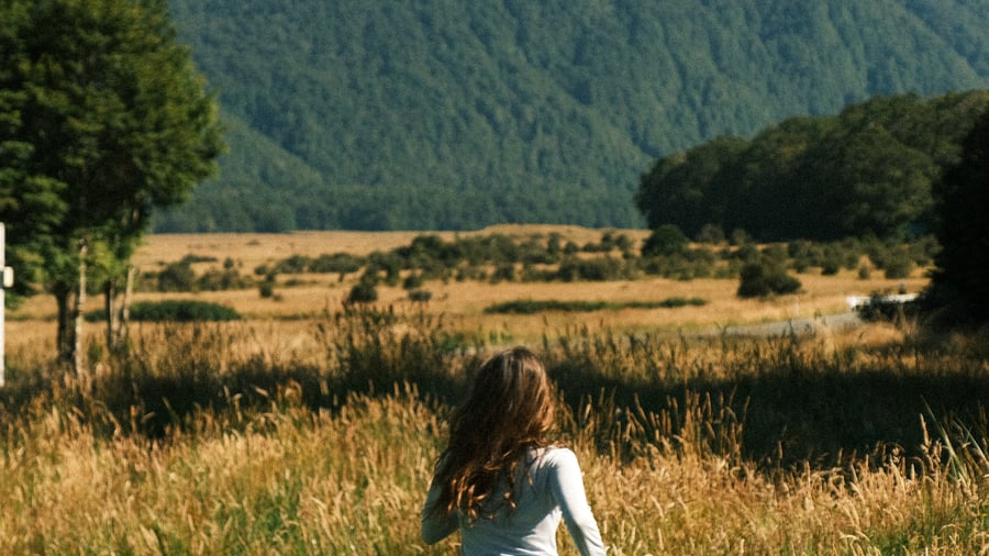 Running towards the landscape of New Zealand