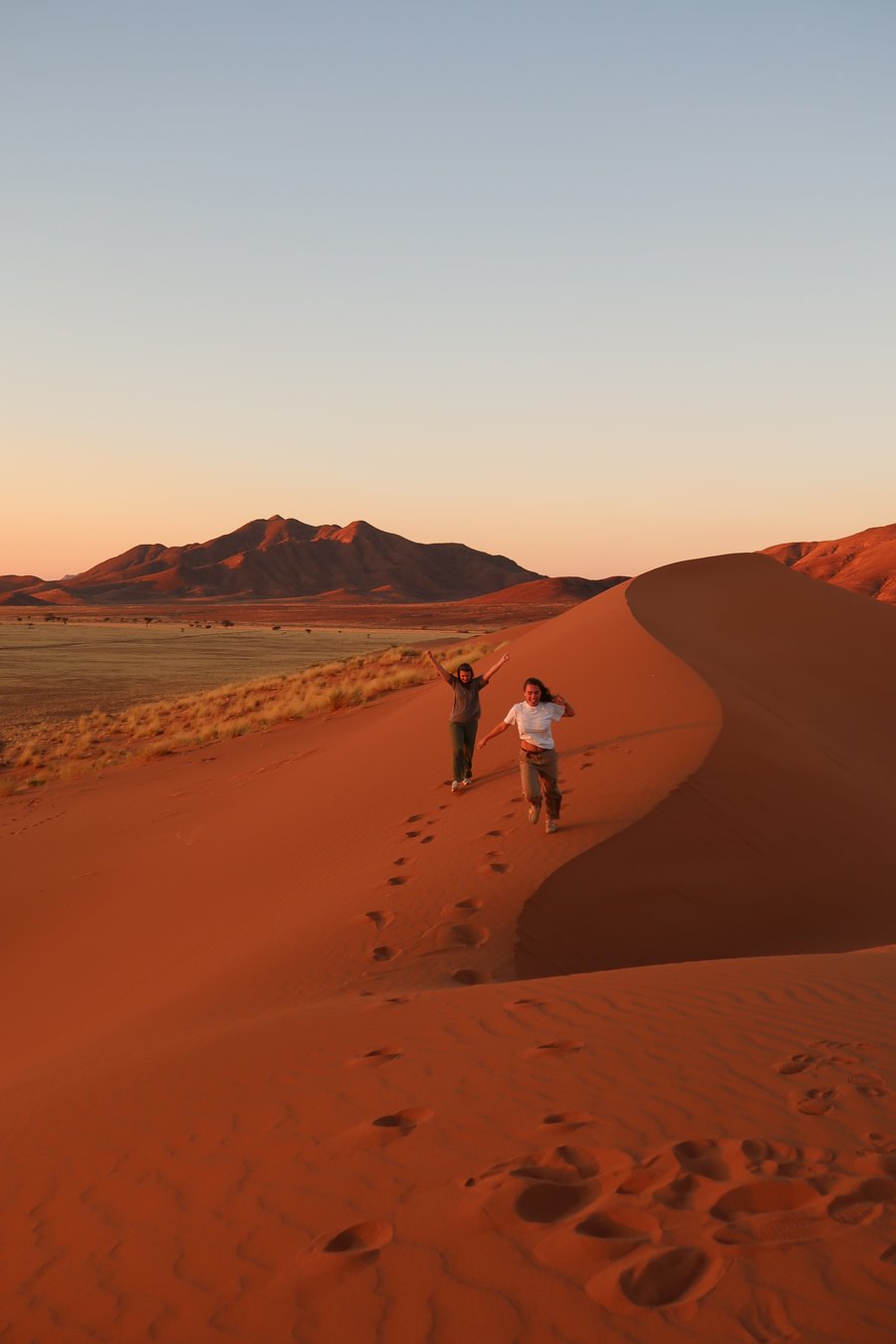 Travellers in the desert in Namibia