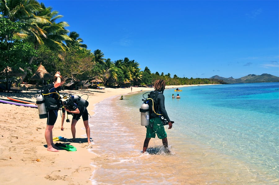 Divers on the beach