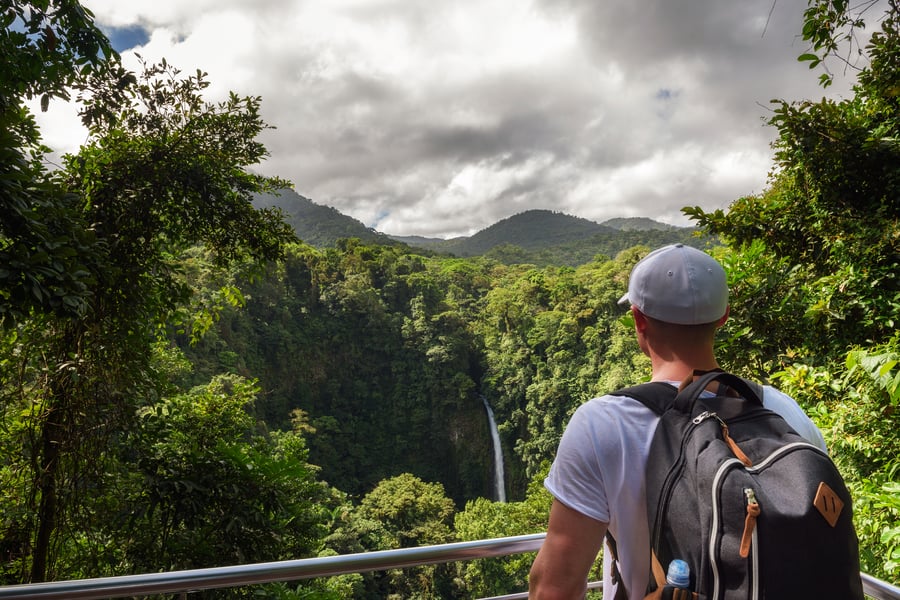 Traveller looking at the jungle in Costa Rica